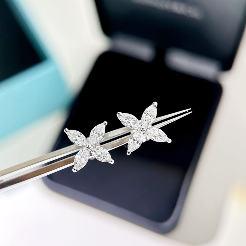 T*f*ny earrings